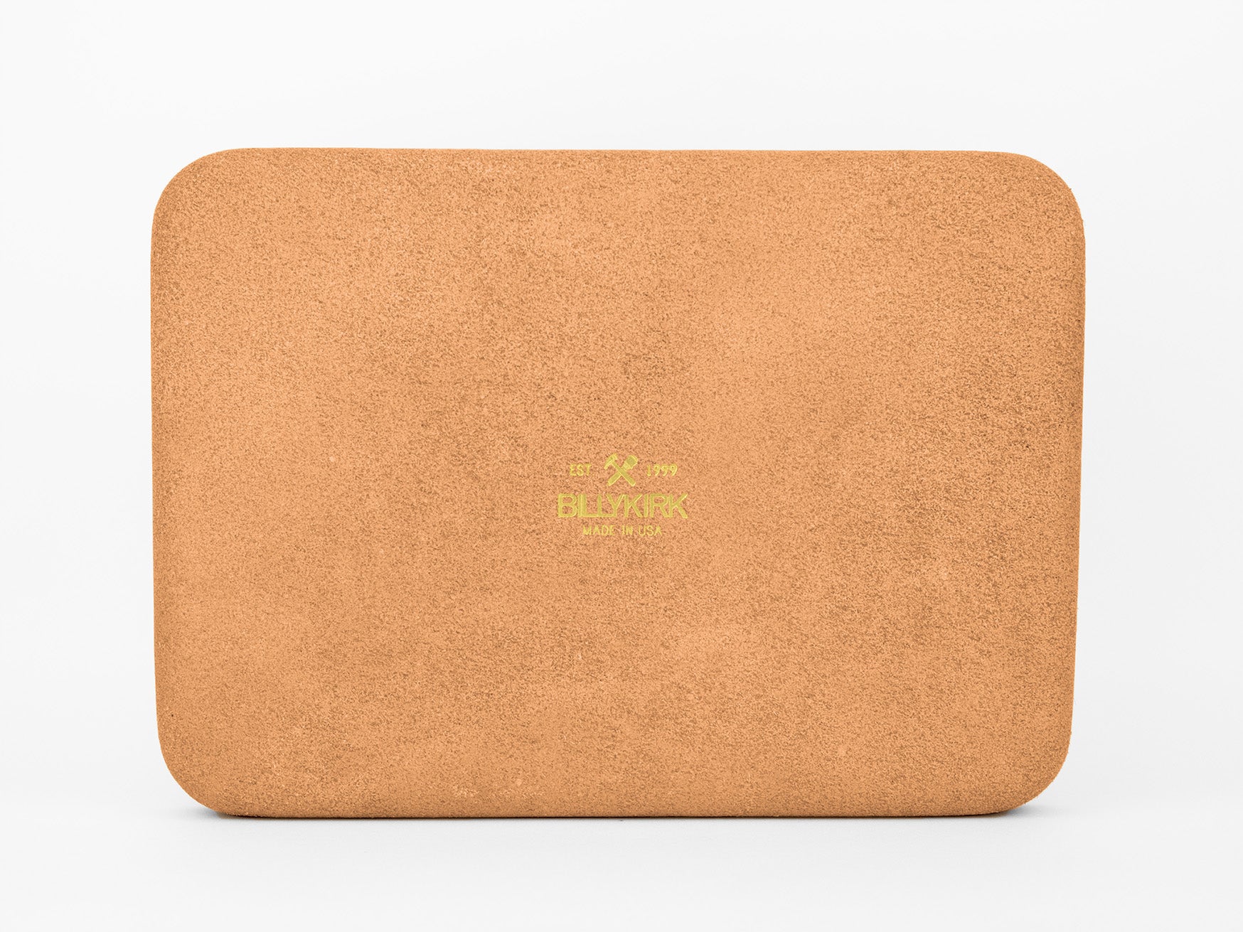 A rectangular, tan cork yoga block with rounded edges. The block features a small, yellow logo and text reading Bluxpark and Wild West in the center. The background is plain white.