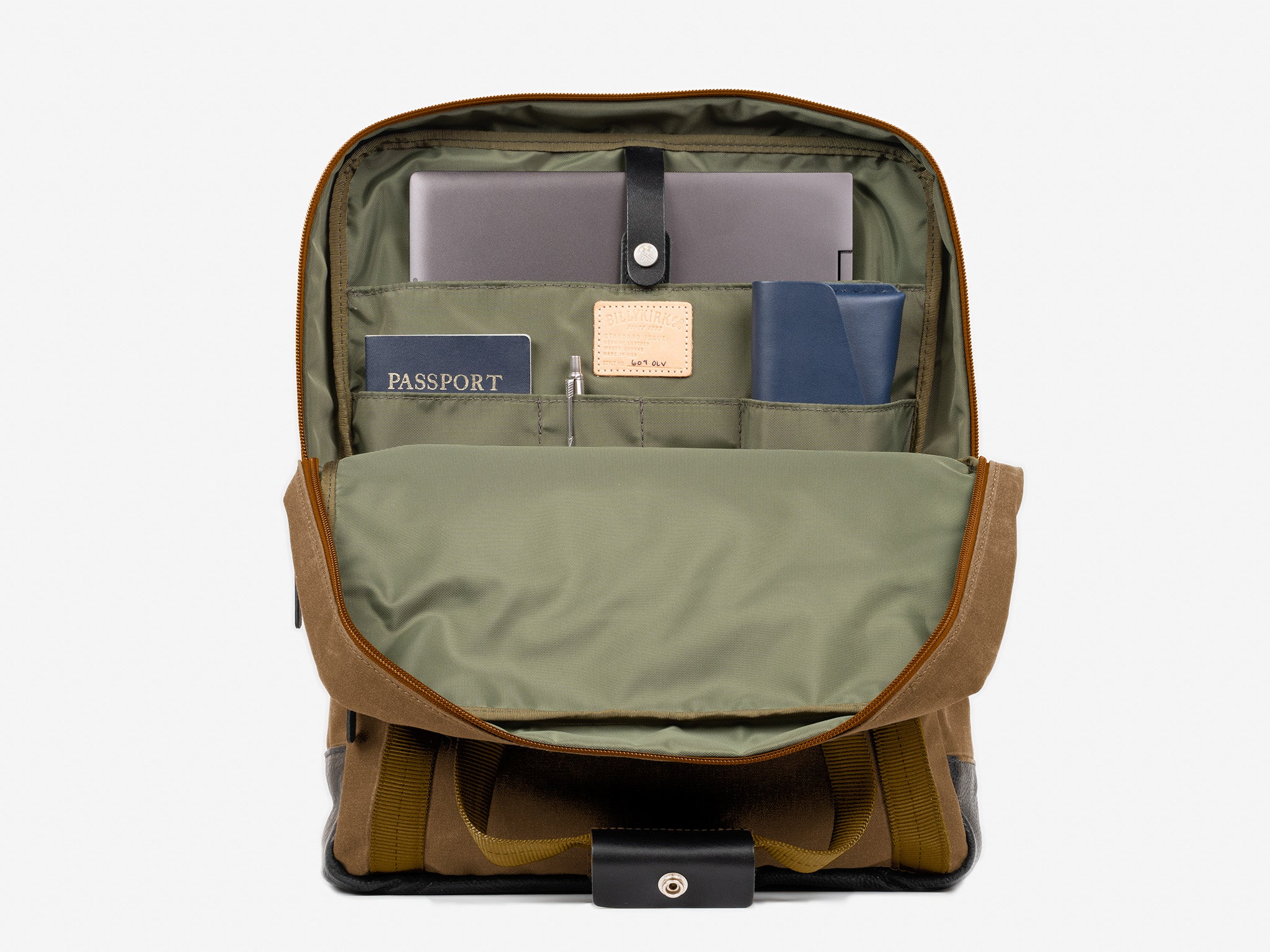 A neatly organized backpack with its front flap open, revealing a laptop, a passport, a pen, a blue notebook, and several compartments holding various items.