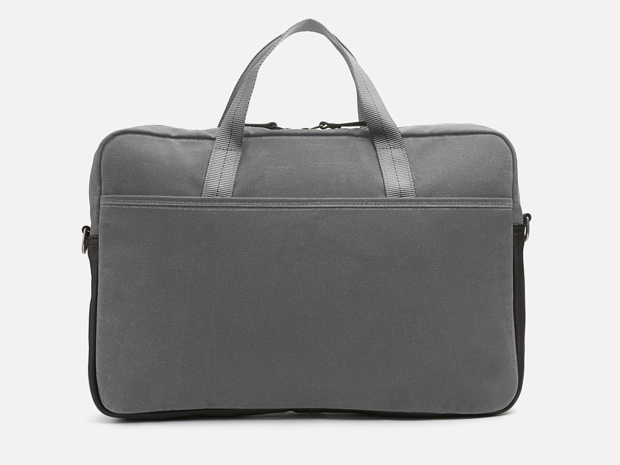 A plain gray fabric laptop bag with two short handles, a front zipper pocket, and black trim on the sides, photographed against a white background.