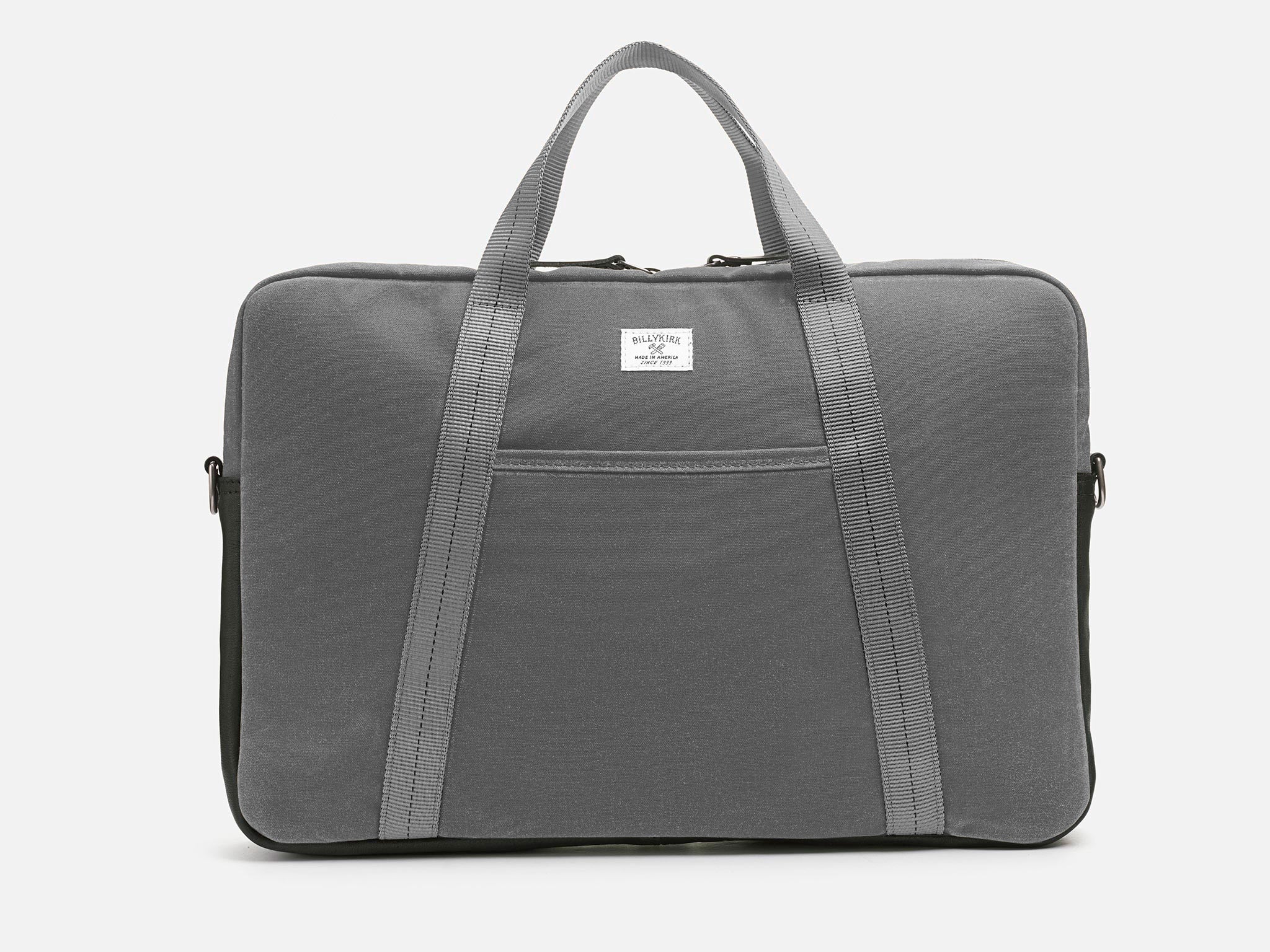 A gray rectangular laptop bag with two sturdy handles, a front pocket, and a small white label centered near the top. The bag has a minimalist design and is photographed against a plain white background.