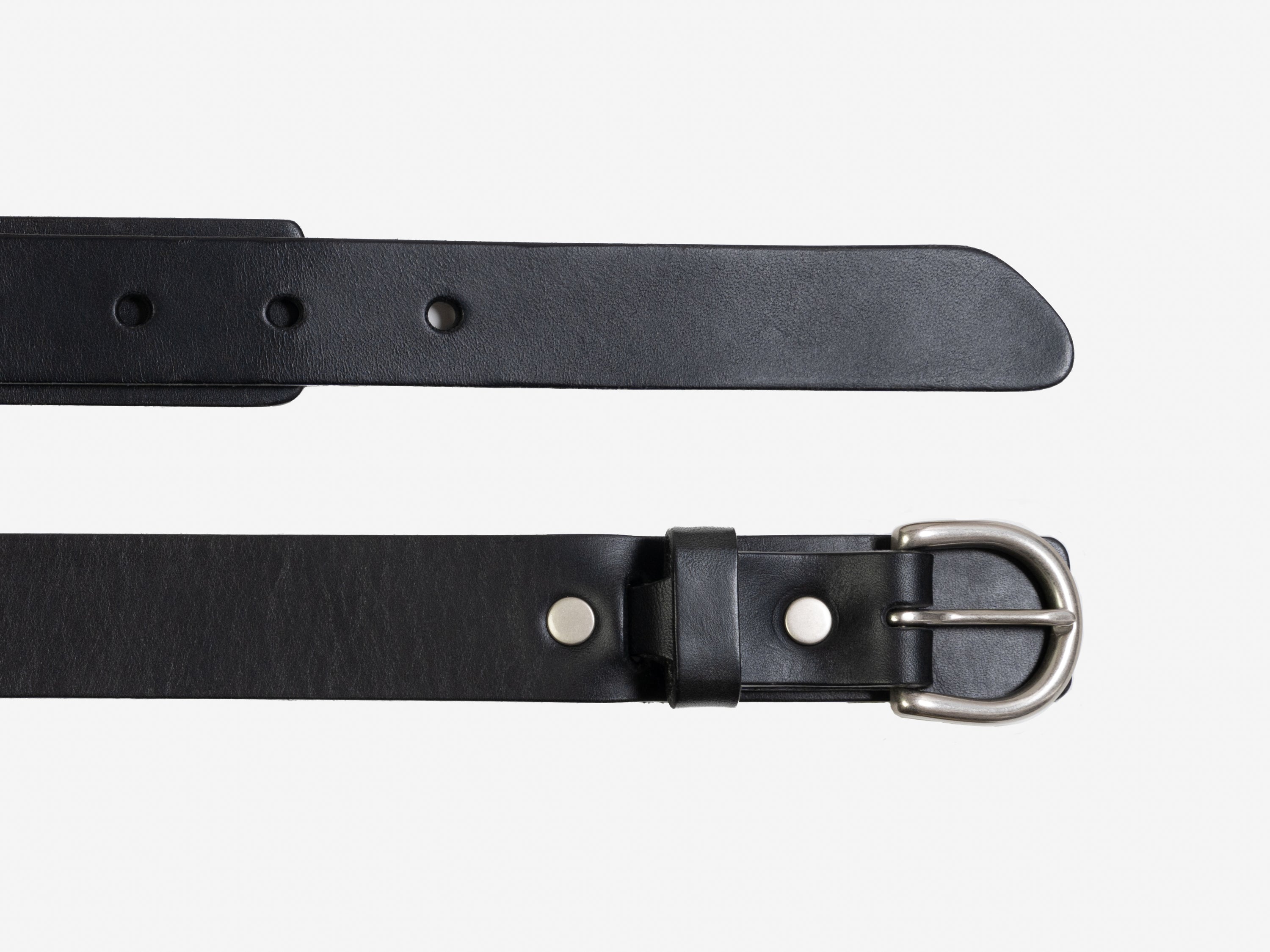 A black leather belt with a silver buckle is shown laid flat against a white background. The belt has multiple holes for adjustment and metal rivets near the buckle.